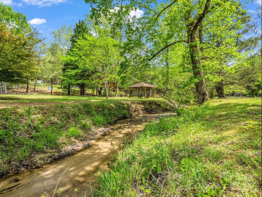 128 Winding Creek Court, Lake Lure, NC 28746.  MLS# CAR4252043, YatesRealty ID 10704. 