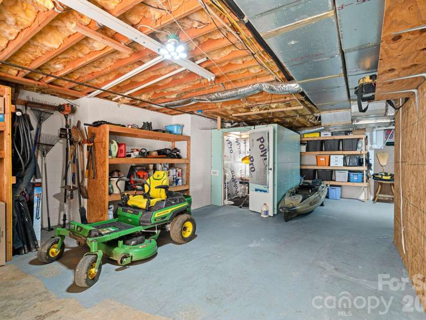 134 Lawrence Tee Lane, Mooresville, NC 28117.  MLS# CAR4359294, YatesRealty ID 10708. Basement Garage