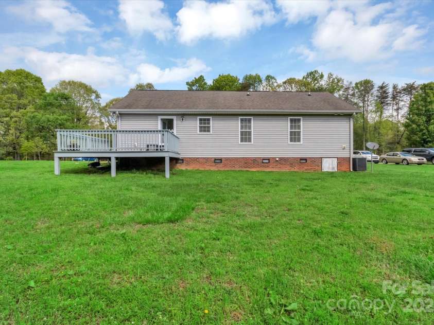 4773 Westwinds Road, Lincolnton, NC 28092.  MLS# CAR4243284, YatesRealty ID 10710. Cozy backyard beside the library with access to a walking trail