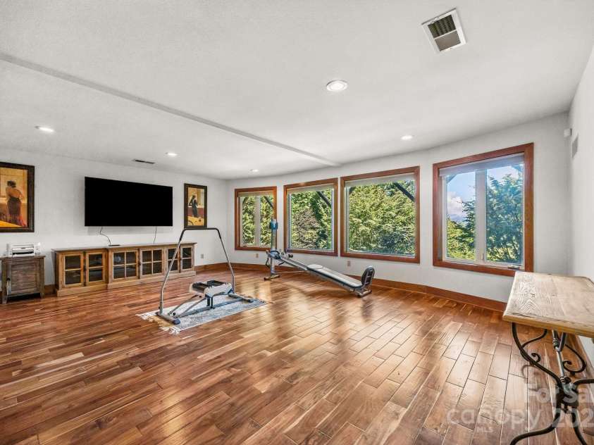 266 Lost Mine Trail, Brevard, NC 28712.  MLS# CAR4278274, YatesRealty ID 10716. Lower Level Family Room