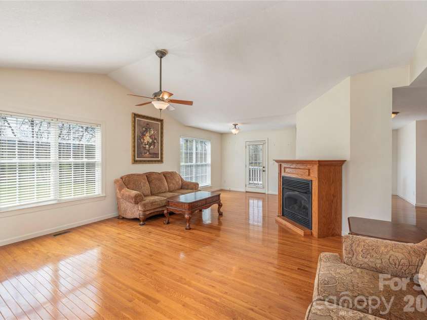 44 Souther Road, Fletcher, NC 28732.  MLS# CAR4357312, YatesRealty ID 10717. Gleaming hardwoods.  Propane fireplace