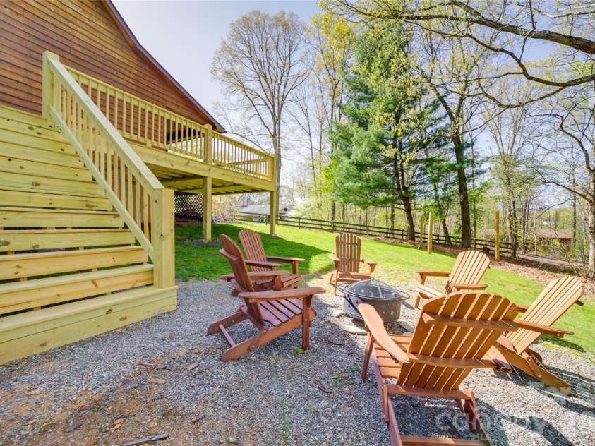 24 Oakwood Road, Candler, NC 28715.  MLS# CAR4343043, YatesRealty ID 10718. Fire pit area