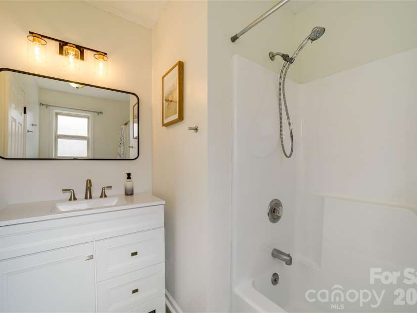 24 Oakwood Road, Candler, NC 28715.  MLS# CAR4343043, YatesRealty ID 10718. Primary bath
