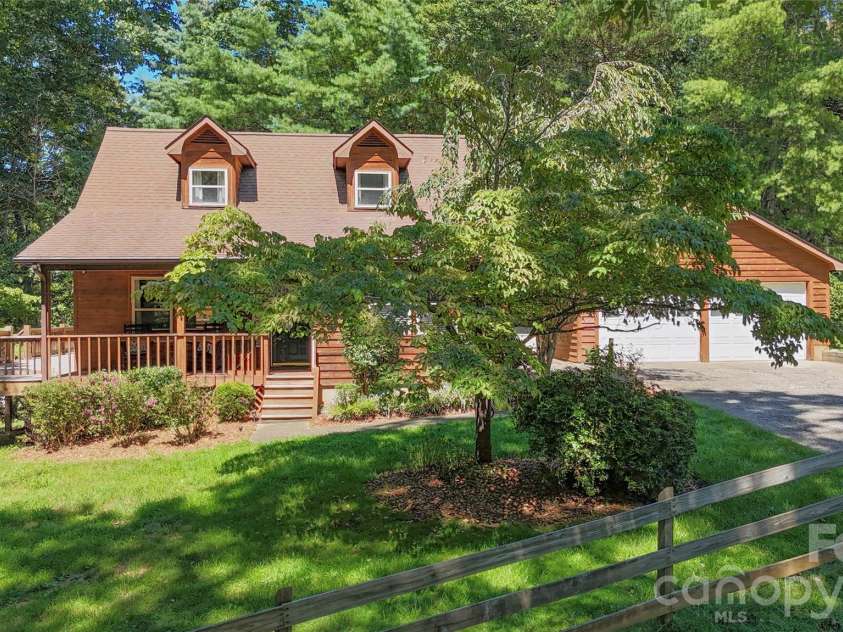 24 Oakwood Road, Candler, NC 28715.  MLS# CAR4415406, YatesRealty ID 10718. 