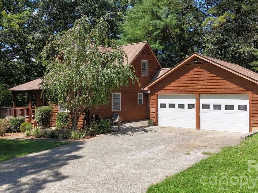 24 Oakwood Road, Candler, NC 28715.  MLS# CAR4415406, YatesRealty ID 10718. 