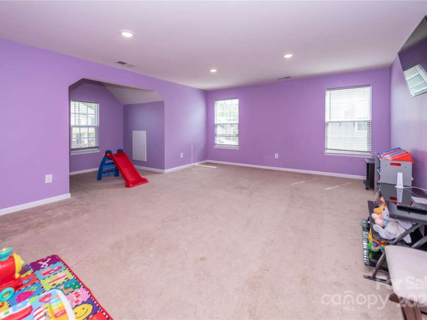 7412 Greene Mill Avenue, Concord, NC 28025.  MLS# CAR4249641, YatesRealty ID 10718. Huge bonus room above the garage