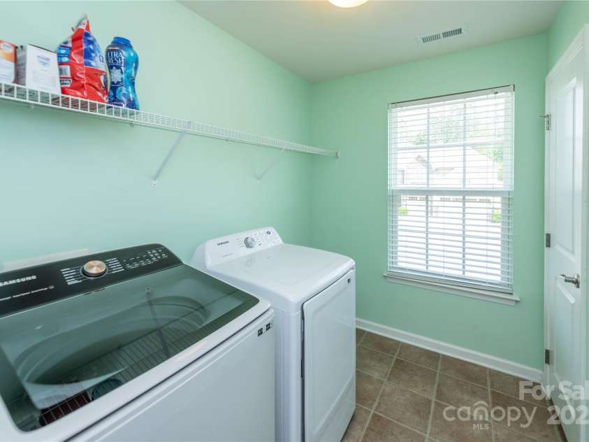 7412 Greene Mill Avenue, Concord, NC 28025.  MLS# CAR4249641, YatesRealty ID 10718. Laundry room on second floor