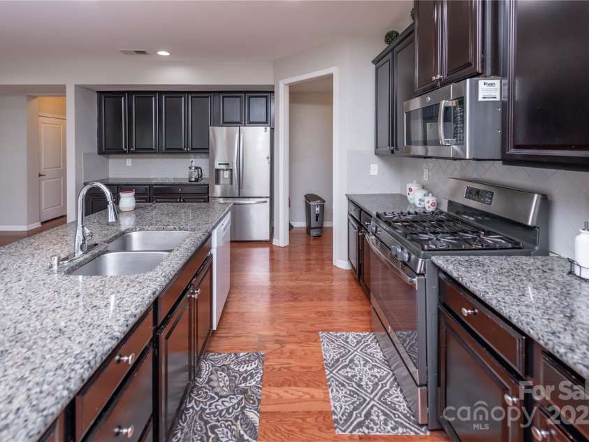 7412 Greene Mill Avenue, Concord, NC 28025.  MLS# CAR4249641, YatesRealty ID 10718. Tons of cabinet storage