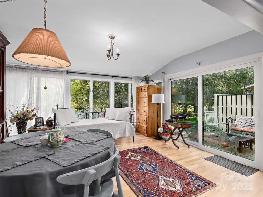 521 Crowfields Lane, Asheville, NC 28803.  MLS# CAR4246106, YatesRealty ID 10719. Sunroom with Patio Sliding Glass Doors