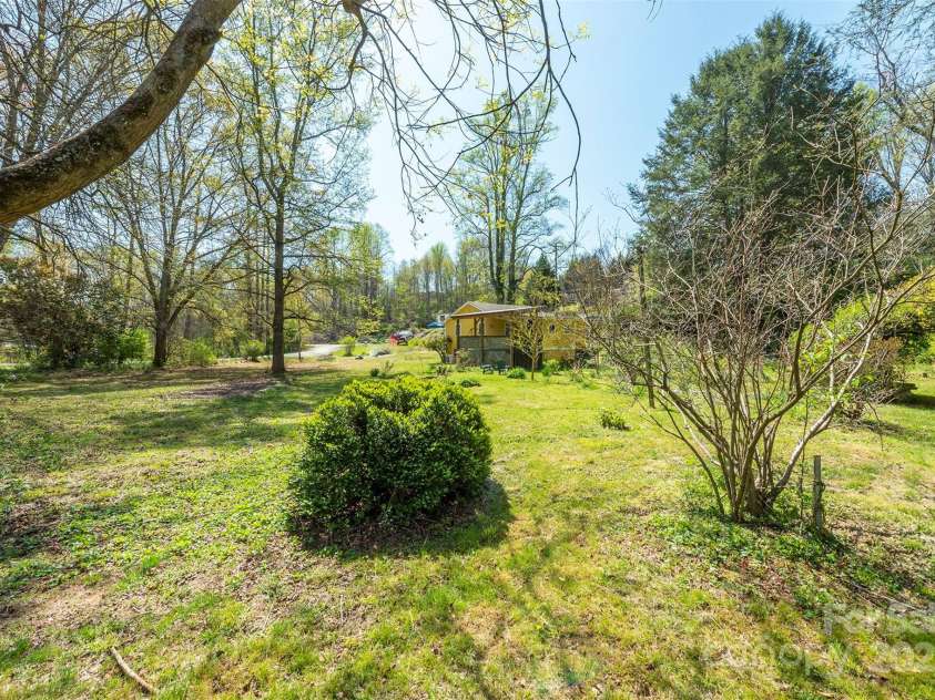 382 Starnes Cove Road, Candler, NC 28715.  MLS# CAR4246519, YatesRealty ID 10721. 