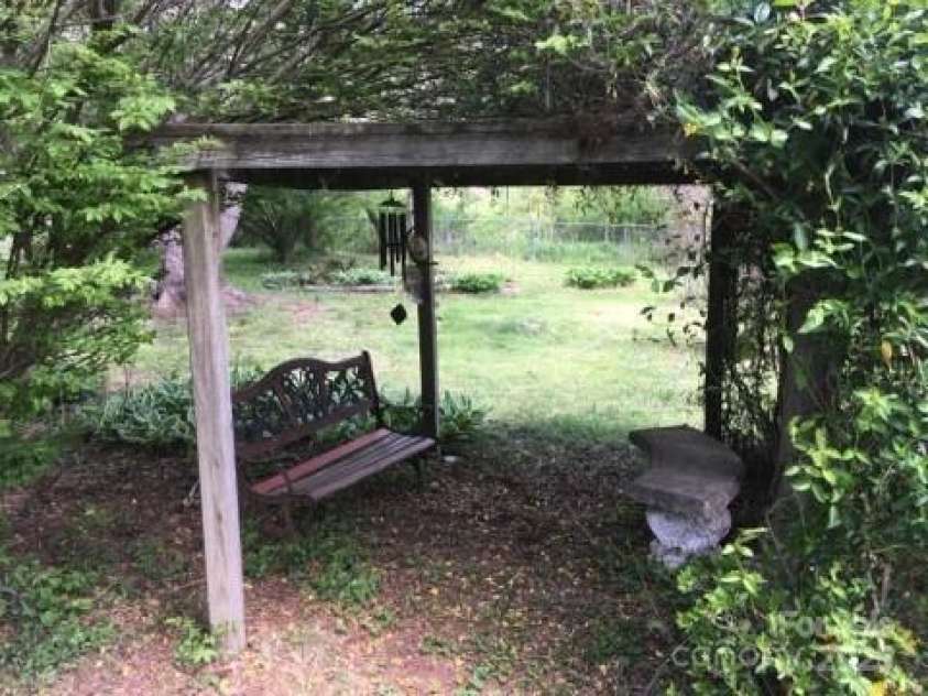 382 Starnes Cove Road, Candler, NC 28715.  MLS# CAR4246519, YatesRealty ID 10721. 