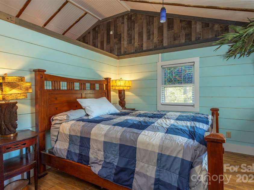 382 Starnes Cove Road, Candler, NC 28715.  MLS# CAR4246519, YatesRealty ID 10721. Main Bedroom