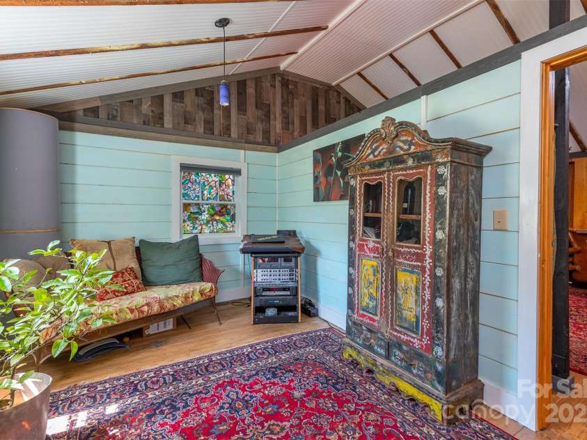 382 Starnes Cove Road, Candler, NC 28715.  MLS# CAR4246519, YatesRealty ID 10721. Main bedroom front area