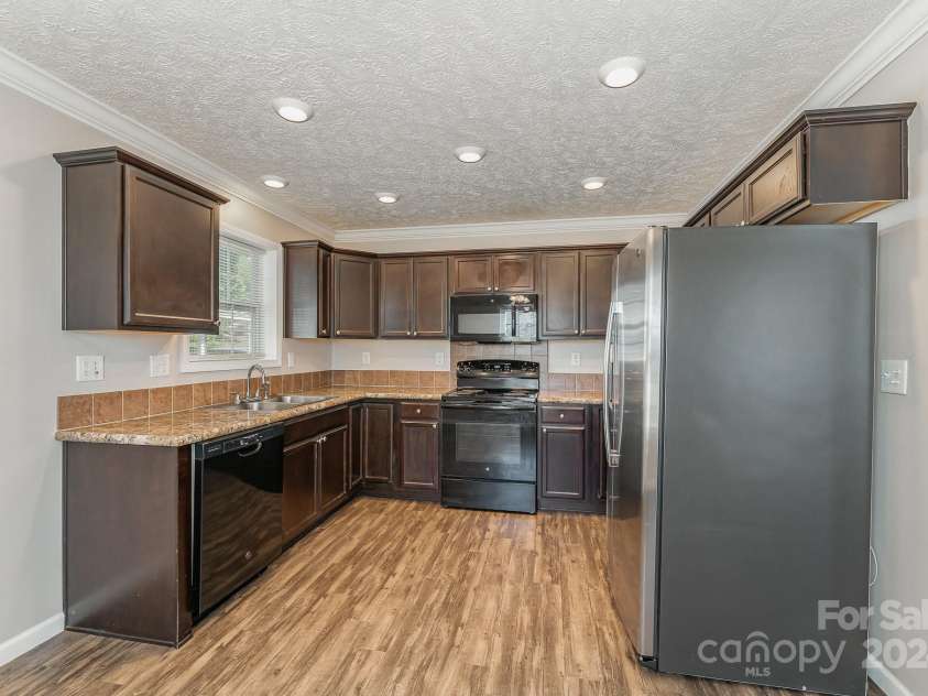 159 Badin Lake Circle, New London, NC 28127.  MLS# CAR4135721, YatesRealty ID 10722. 