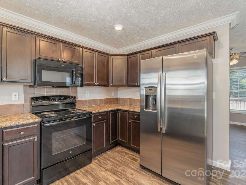 159 Badin Lake Circle, New London, NC 28127.  MLS# CAR4135721, YatesRealty ID 10722. 