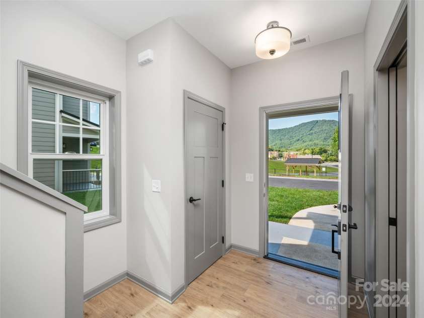 200 Red Twig Lane, Burnsville, NC 28714.  MLS# CAR4167529, YatesRealty ID 10723. Foyer and coat closet