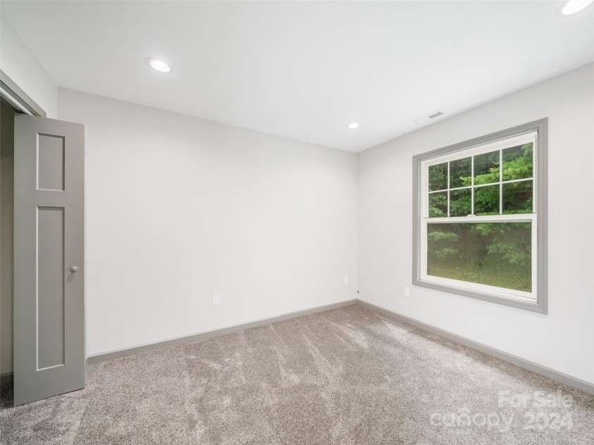 200 Red Twig Lane, Burnsville, NC 28714.  MLS# CAR4167529, YatesRealty ID 10723. Guest Bedroom #3 to the rear of home