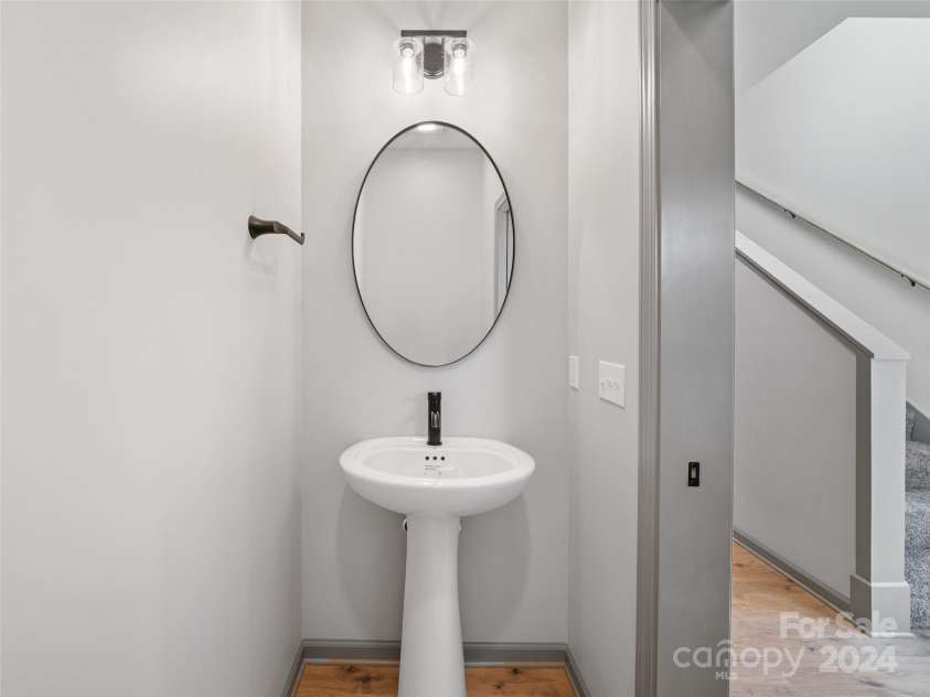 200 Red Twig Lane, Burnsville, NC 28714.  MLS# CAR4167529, YatesRealty ID 10723. Half Bath off foyer entrance