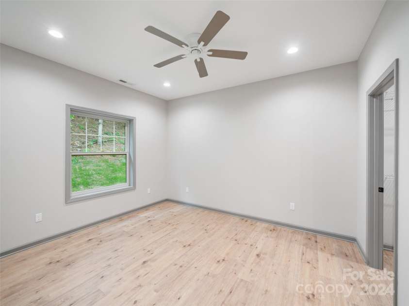 200 Red Twig Lane, Burnsville, NC 28714.  MLS# CAR4167529, YatesRealty ID 10723. Primary bedroom #1 on main level