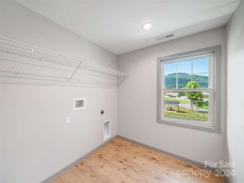 200 Red Twig Lane, Burnsville, NC 28714.  MLS# CAR4167529, YatesRealty ID 10723. Primary Bedroom #2 has city views and mtn. Views