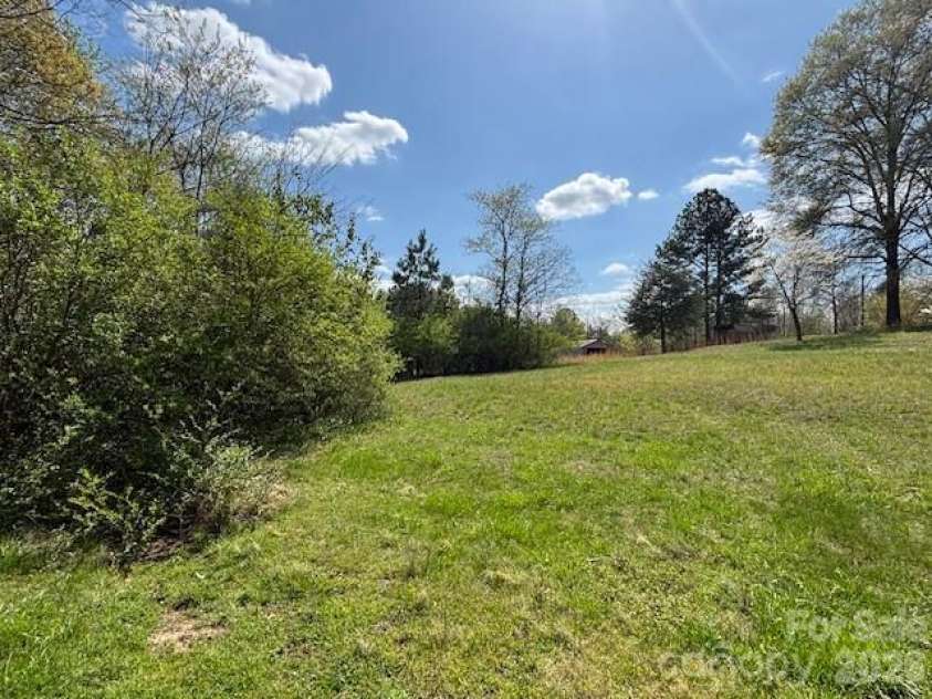 2273 Trail Avenue, Kannapolis, NC 28081.  MLS# CAR4361604, YatesRealty ID 10725. View behind Workshop/Garage