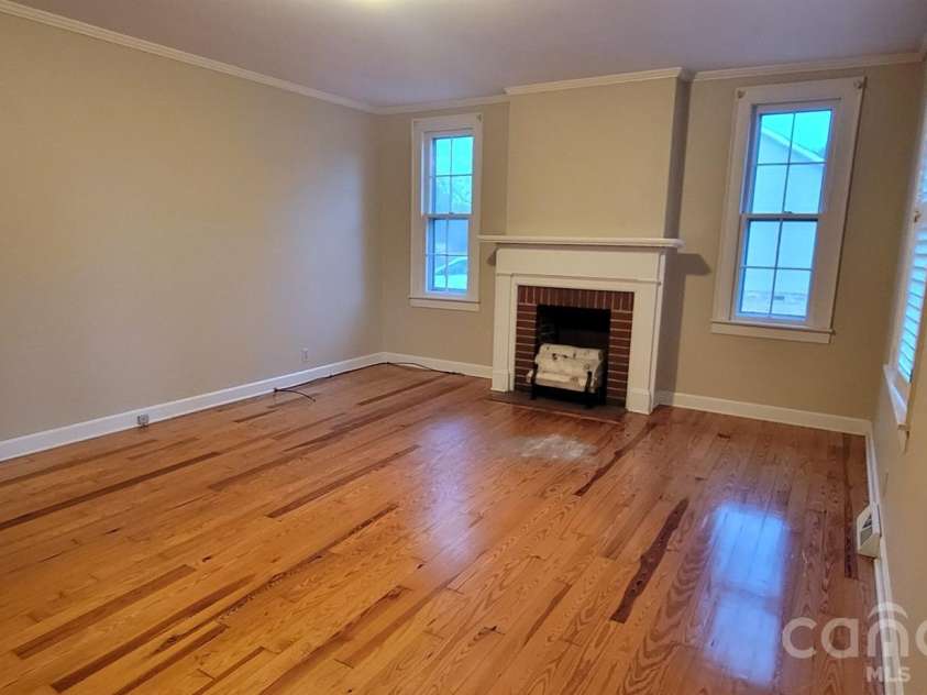 651 Still Street, Chester, SC 29706.  MLS# CAR4287428, YatesRealty ID 10726. Living room with fireplace