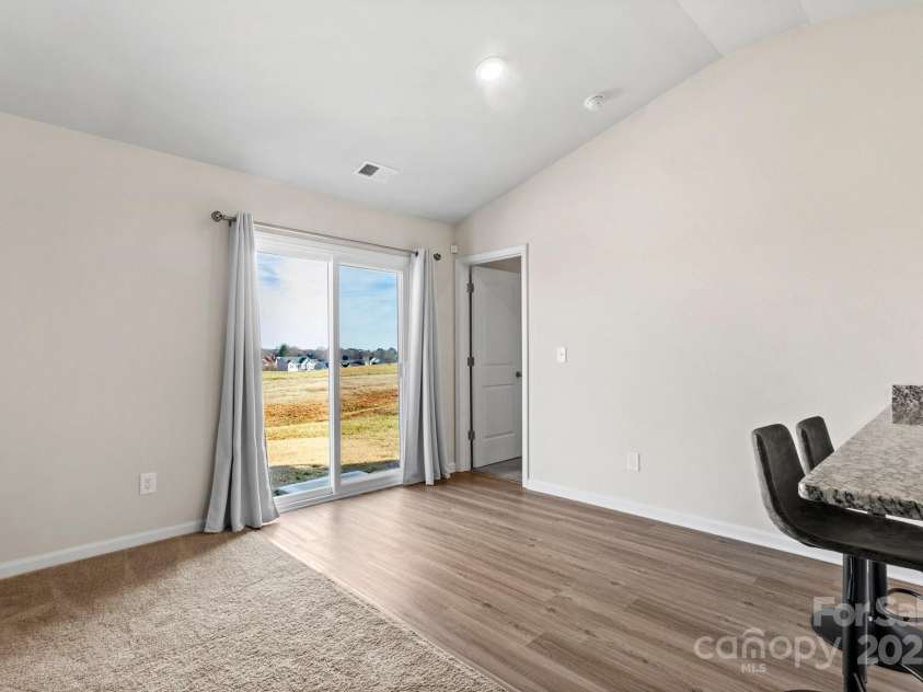 324 Aniston Lane, Shelby, NC 28152.  MLS# CAR4227228, YatesRealty ID 10727. Sliding door w/ additional screen door goes to back yard off kitchen/family room