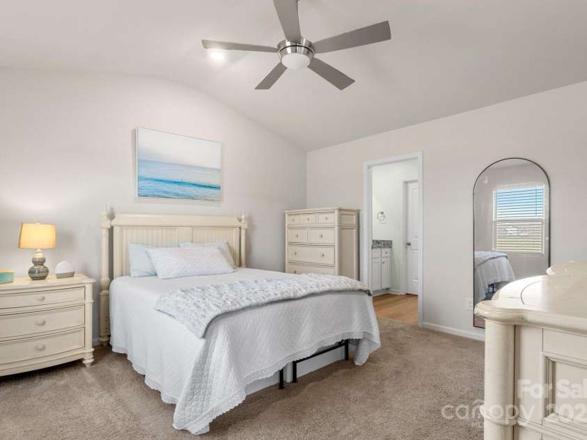 324 Aniston Lane, Shelby, NC 28152.  MLS# CAR4227228, YatesRealty ID 10727. The vaulted ceiling continues into the primary bedroom.