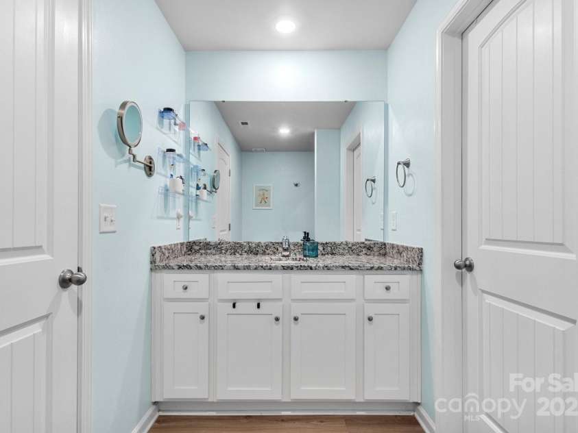 324 Aniston Lane, Shelby, NC 28152.  MLS# CAR4227228, YatesRealty ID 10727. Vanity with granite countertops in primary bath
