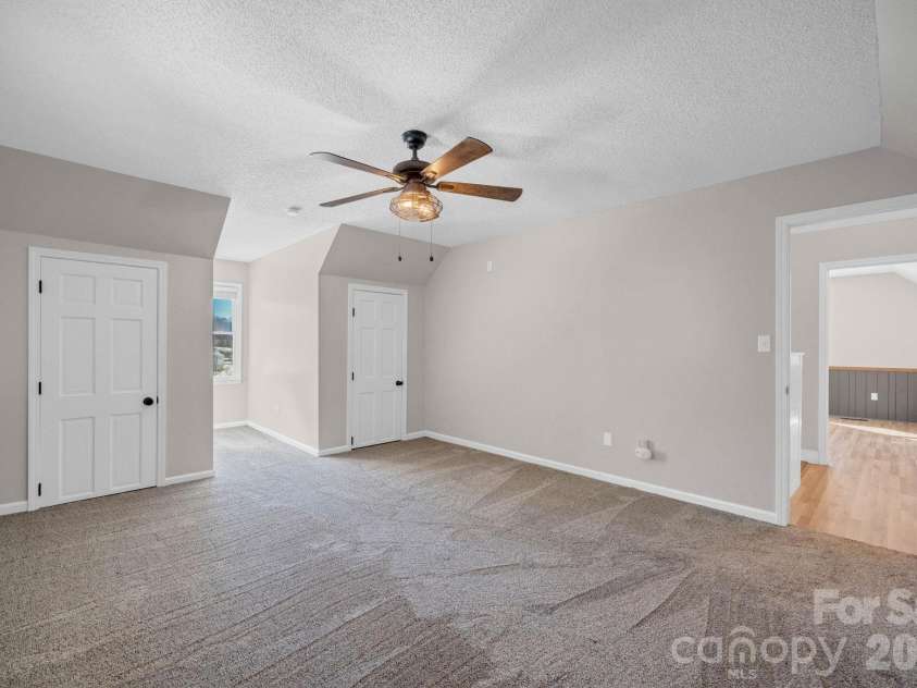 2581 Double Island Road, Burnsville, NC 28740.  MLS# CAR4320527, YatesRealty ID 10747. Upstairs bedroom 1