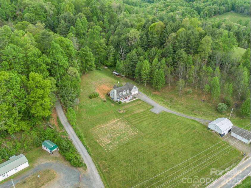 2581 Double Island Road, Green Mountain, NC 28740.  MLS# CAR4255592, YatesRealty ID 10747. 
