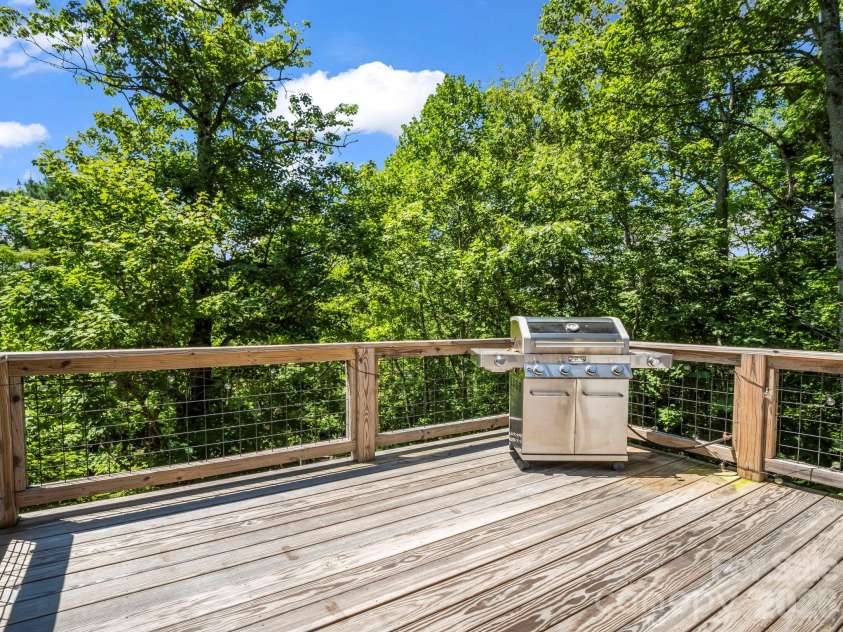 38 Scenic View Drive, Hendersonville, NC 28792.  MLS# CAR4357881, YatesRealty ID 10755. First Floor Deck with winter view