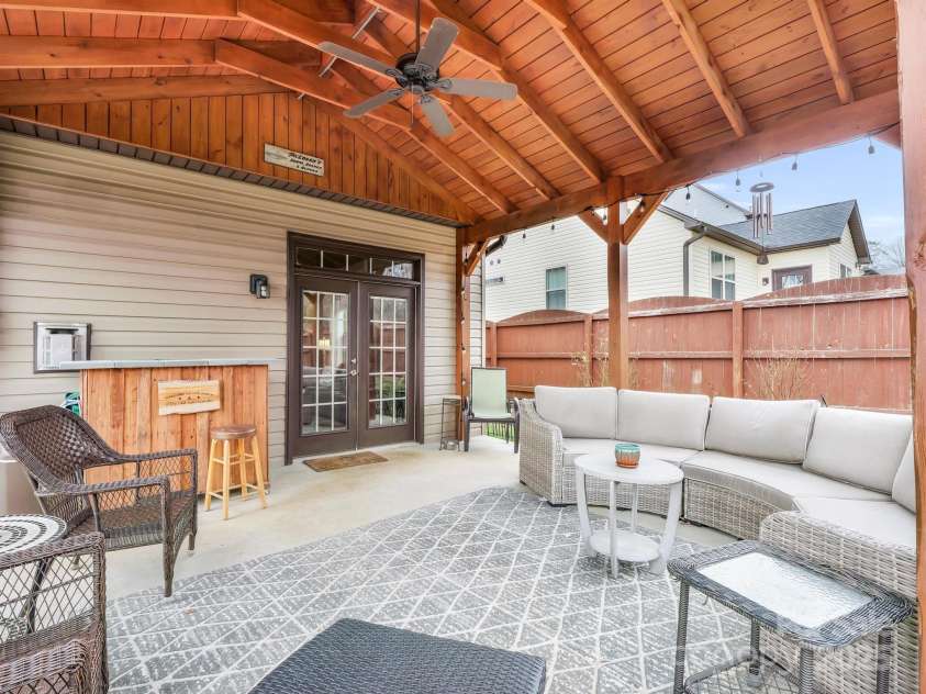 8 Mallard Run Drive, Arden, NC 28704.  MLS# CAR4238190, YatesRealty ID 10764. Expansive covered patio for outdoor enjoyment and entertainment.