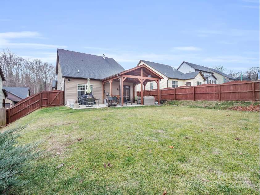 8 Mallard Run Drive, Arden, NC 28704.  MLS# CAR4238190, YatesRealty ID 10764. Fully fenced back yard provides safe fun for everyone.