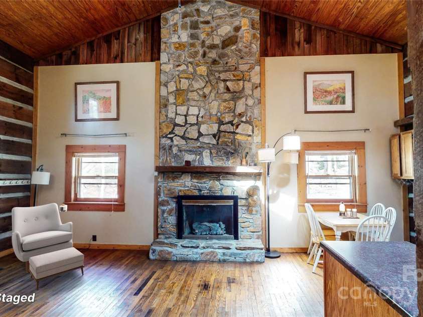 1080 Wolf Branch Road, Marshall, NC 28753.  MLS# CAR4233203, YatesRealty ID 10767. Virtually Staged Livingroom. This image has been virtually staged. Furniture placement is for visual inspiration and may not reflect actual dimensions or scale.