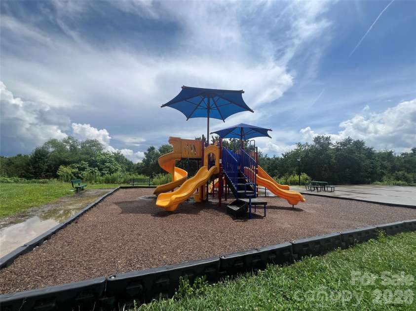 197 Roanoke Road, Fletcher, NC 28732.  MLS# CAR4399484, YatesRealty ID 10767. Community playground