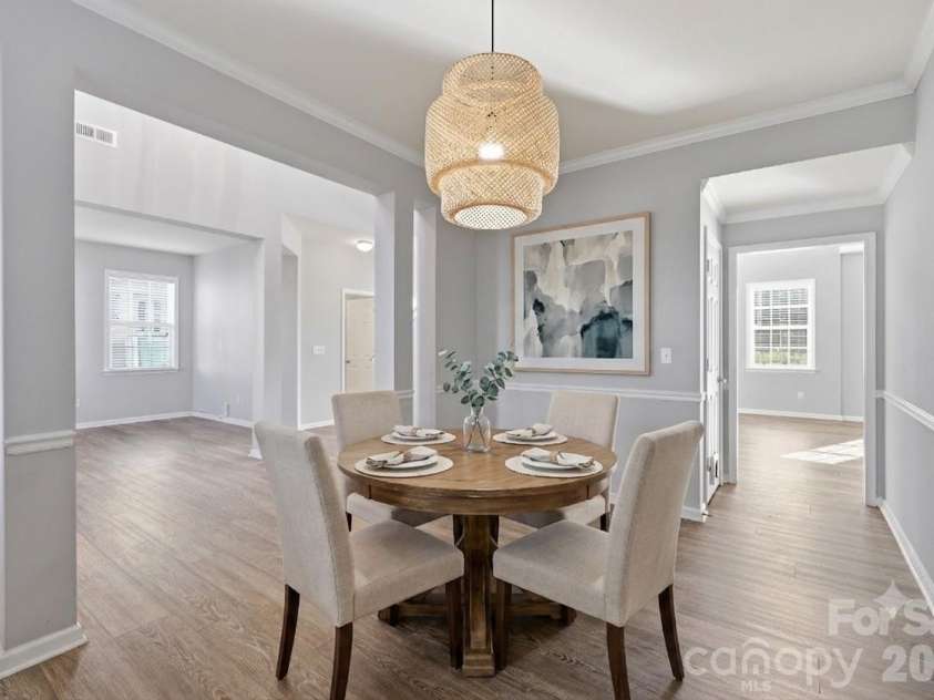 197 Roanoke Road, Fletcher, NC 28732.  MLS# CAR4399484, YatesRealty ID 10767. Formal dining room - digitally staged