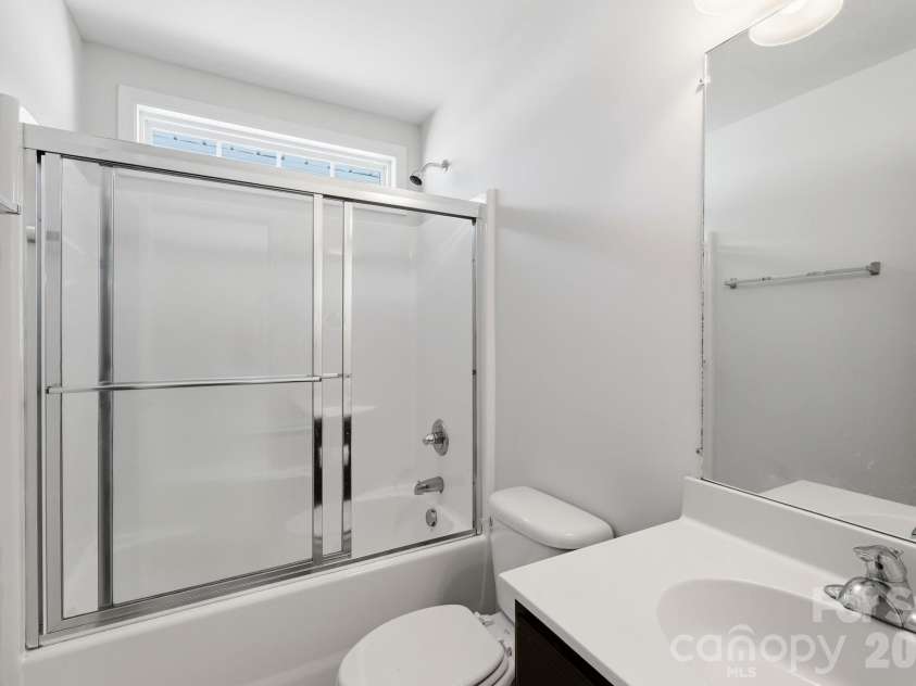 197 Roanoke Road, Fletcher, NC 28732.  MLS# CAR4399484, YatesRealty ID 10767. Guest bathroom upstairs