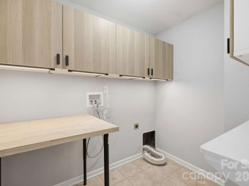 197 Roanoke Road, Fletcher, NC 28732.  MLS# CAR4399484, YatesRealty ID 10767. Laundry room