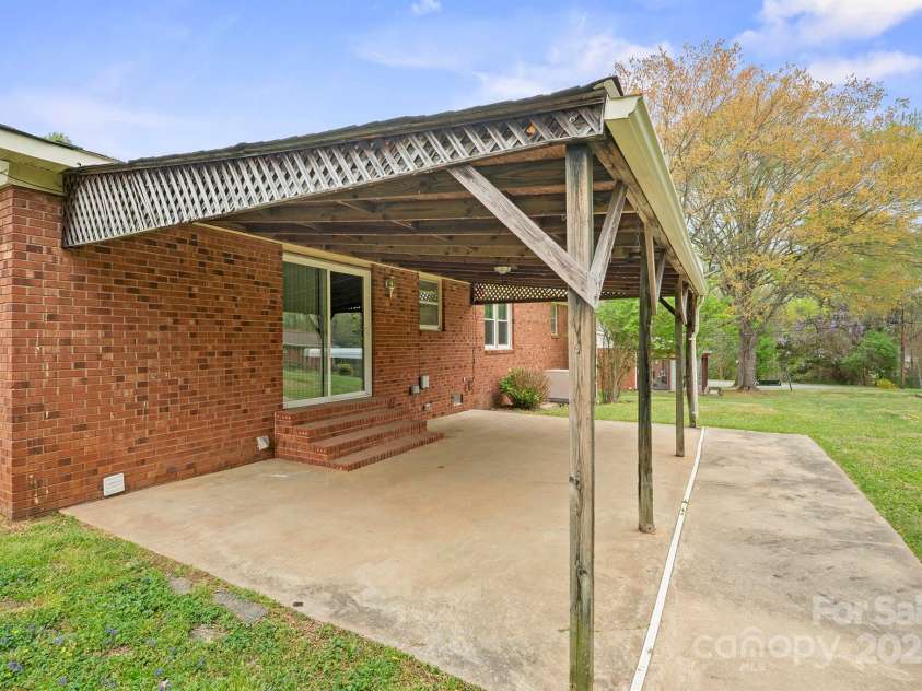 303 Windy Rush Road, Kannapolis, NC 28081.  MLS# CAR4242125, YatesRealty ID 10768. Covered rear patio
