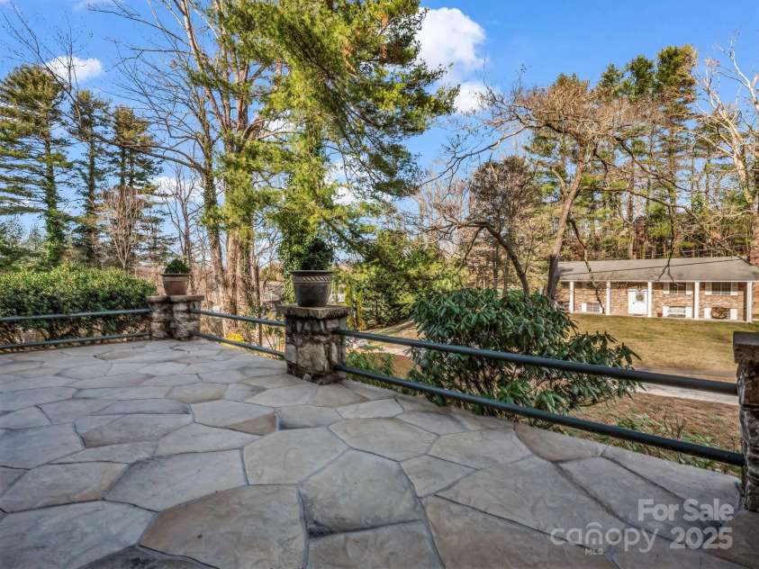 1401 Highland Avenue, Hendersonville, NC 28792.  MLS# CAR4220096, YatesRealty ID 1077. Wide beautiful front porch.