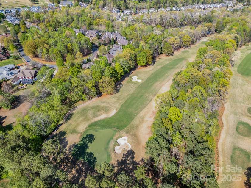 751 Mendenhall Court, Fort Mill, SC 29715.  MLS# CAR4239100, YatesRealty ID 10770. 0.63 acre estate on golf course at hole 11