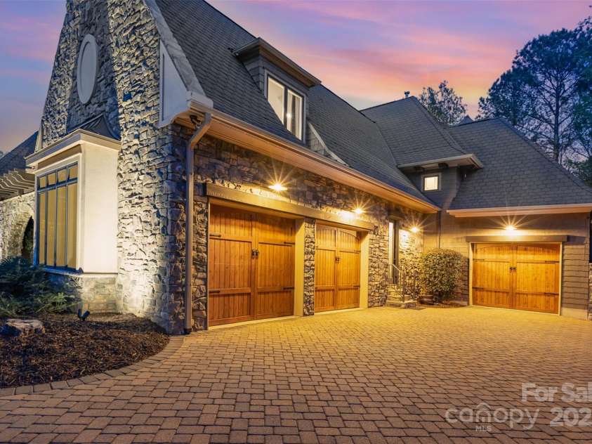 751 Mendenhall Court, Fort Mill, SC 29715.  MLS# CAR4239100, YatesRealty ID 10770. 3-car garage including Porsche garage on right