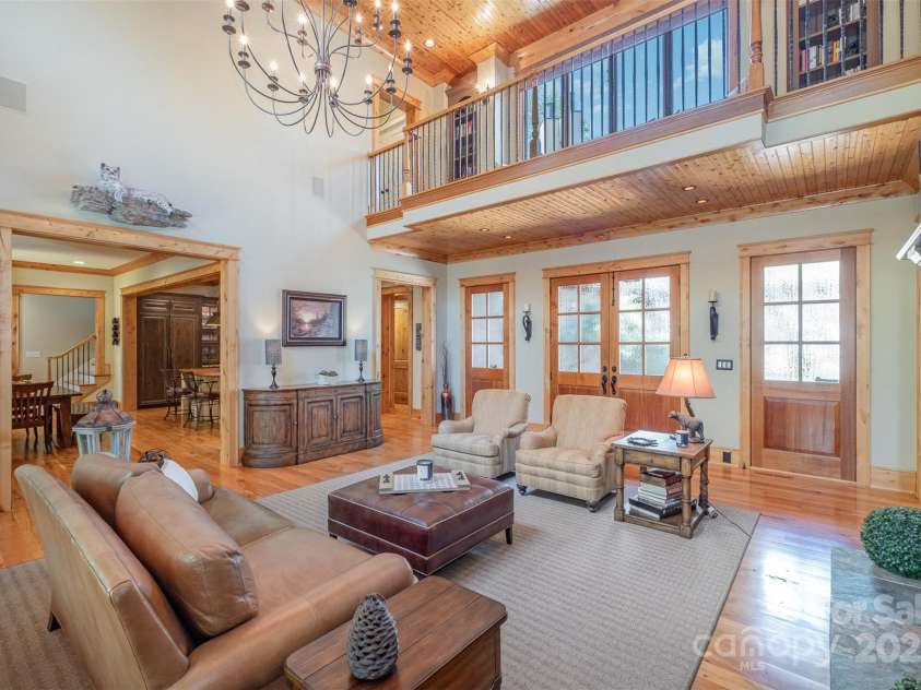 751 Mendenhall Court, Fort Mill, SC 29715.  MLS# CAR4239100, YatesRealty ID 10770. Great room with Library bridge above