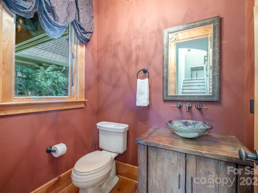 751 Mendenhall Court, Fort Mill, SC 29715.  MLS# CAR4239100, YatesRealty ID 10770. Half Bath custom Glass sink off Great room