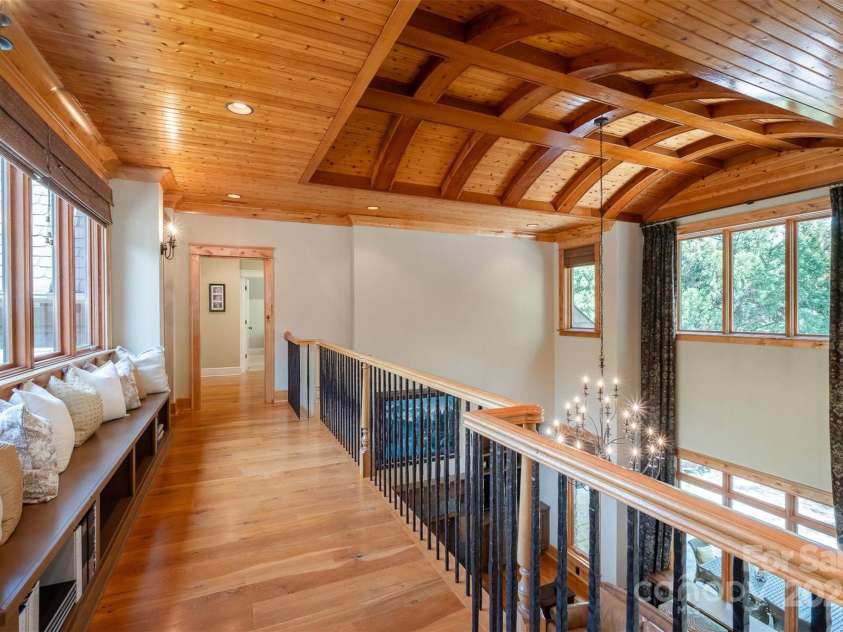 751 Mendenhall Court, Fort Mill, SC 29715.  MLS# CAR4239100, YatesRealty ID 10770. Library on bridge with perfect view of barrel coffered ceiling