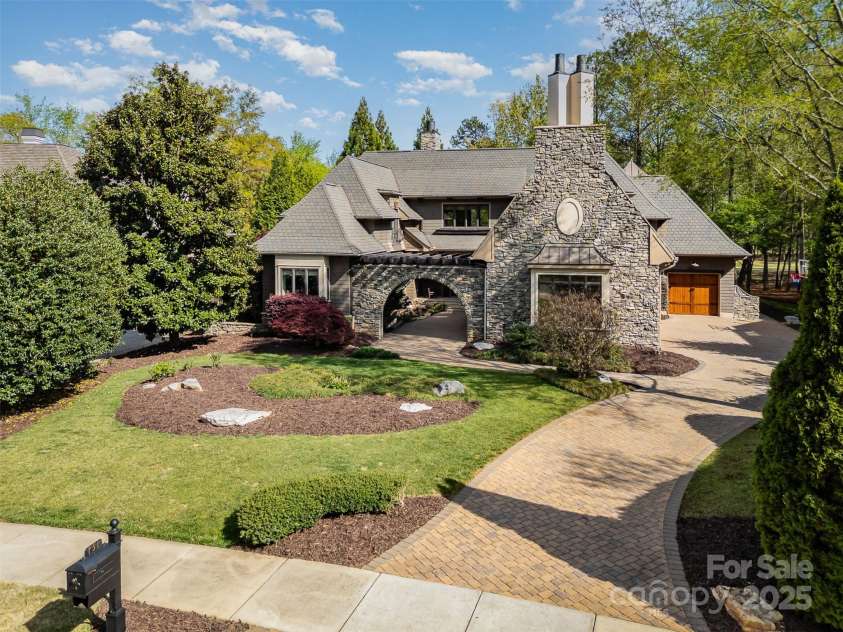751 Mendenhall Court, Fort Mill, SC 29715.  MLS# CAR4239100, YatesRealty ID 10770. Paver driveway into the 3-car garage