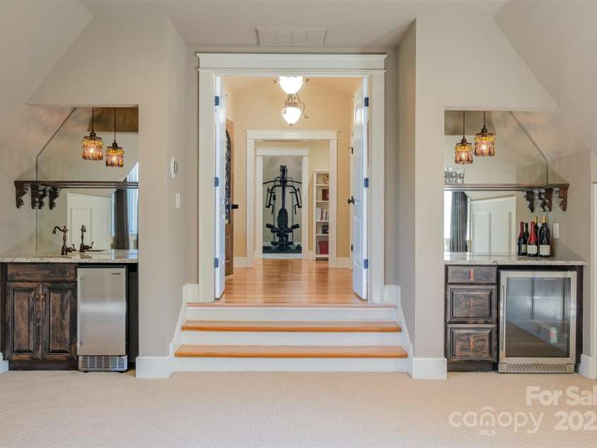 751 Mendenhall Court, Fort Mill, SC 29715.  MLS# CAR4239100, YatesRealty ID 10770. Theatre room with wet bar, ice maker and drink fridge