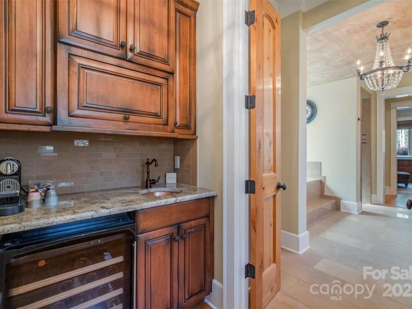 751 Mendenhall Court, Fort Mill, SC 29715.  MLS# CAR4239100, YatesRealty ID 10770. Wet Bar in Primary Suite to enjoy your coffee