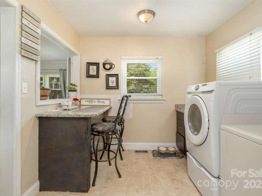 145 Driftwood Drive, Mooresville, NC 28117.  MLS# CAR4253842, YatesRealty ID 10771. Breakfast area & Laundry